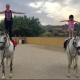 mum and daughter horse riding
